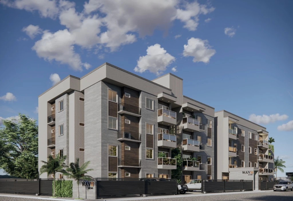 Fachada do empreendimento Wave Jacumã, prédio residencial contemporâneo com varandas e paisagismo no litoral